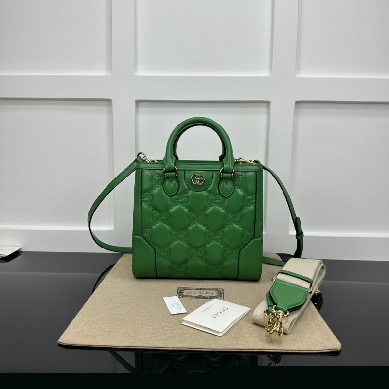 G*u*i top handle bags